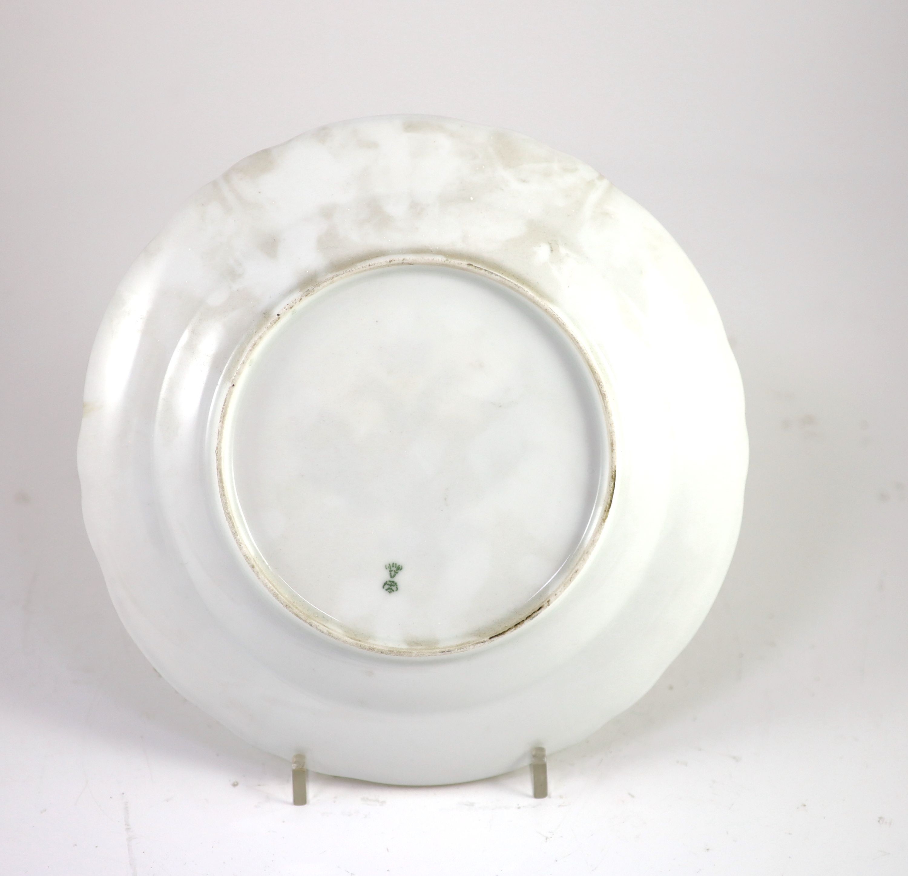 A Russian porcelain armorial plate, Imperial Porcelain Factory, St. Petersburg, Period of Alexander II, (ruled 1856-81), 24.8 cm diameter